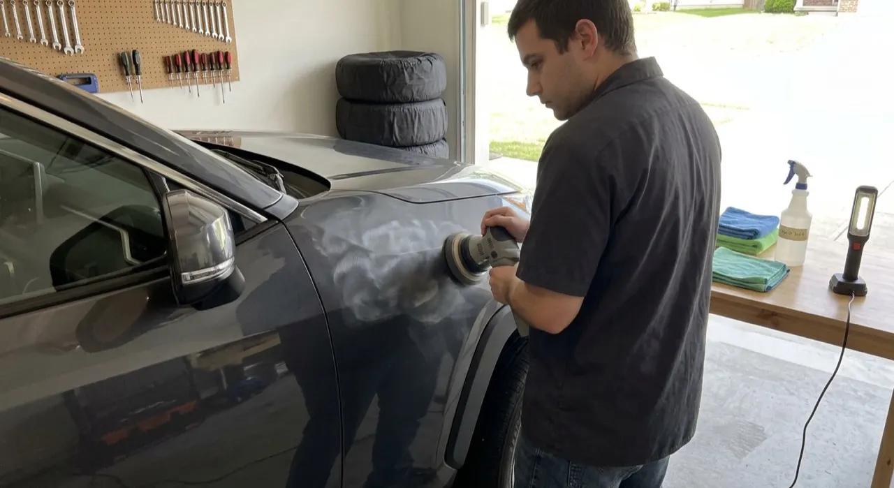 Polishing Mistakes: Holograms, Burn-Through & More Fixed — a dual-action polishing machine on flawless swirl-free glossy car paint