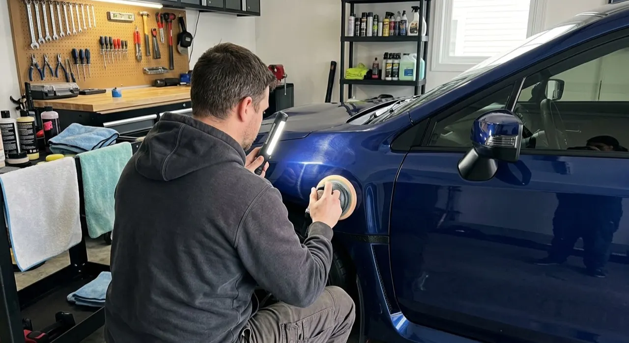 How to Remove Swirl Marks (Without Burning Your Clear Coat) — a dual-action polishing machine on flawless swirl-free glossy car paint
