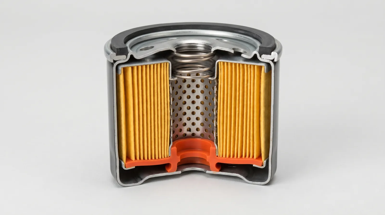 Cutaway of a spin-on oil filter showing pleated media, anti-drainback valve and bypass spring