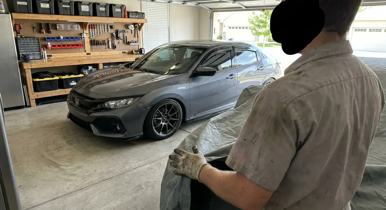 Best Car Covers for Sun & UV Protection — being worked on, seen from behind