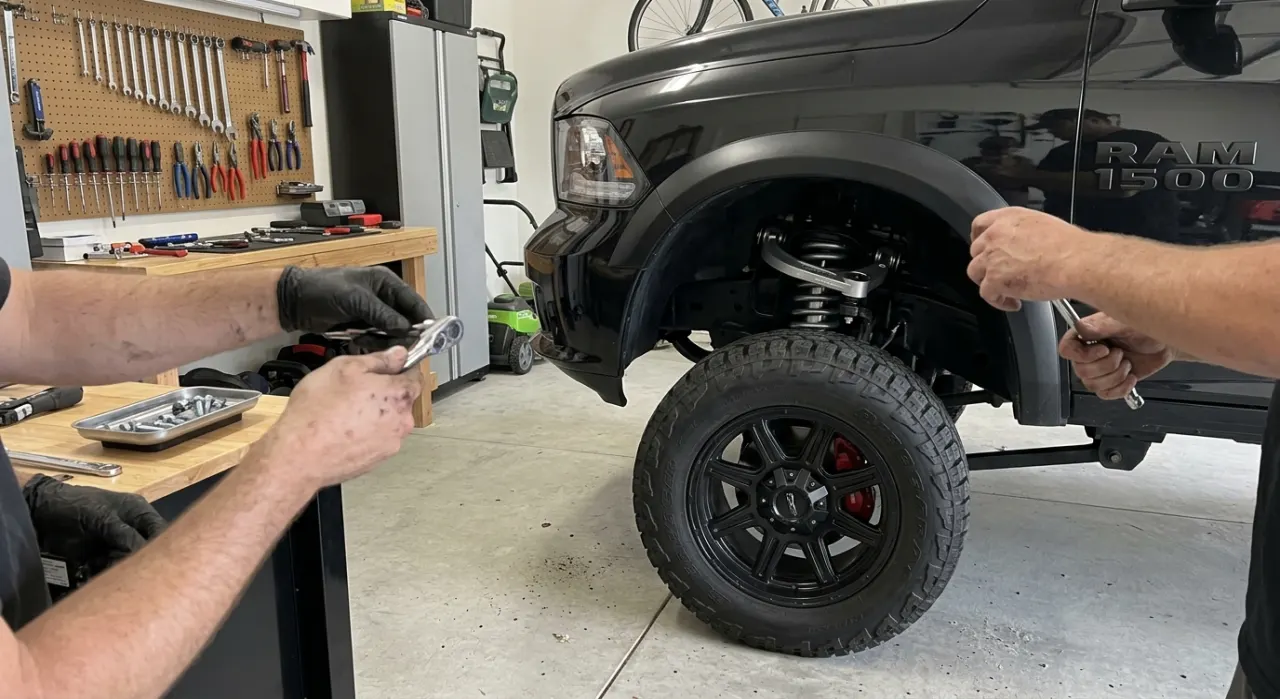 Struts vs Shocks — being worked on, seen from behind